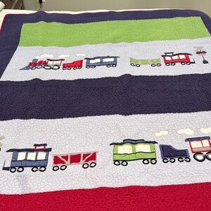 Reversible Twin train quilt with matching sham.